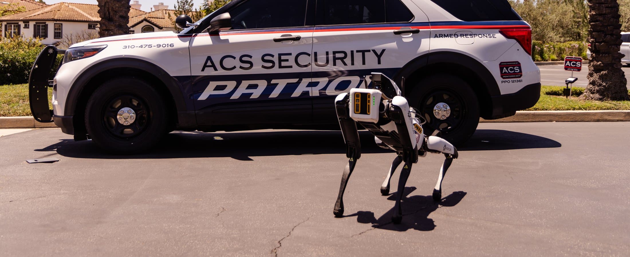 ACS Security DroneDog robotic patrol with ACS patrol vehicle